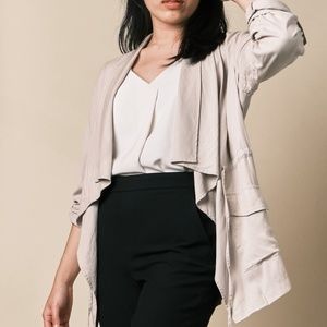 Cream-Colored Ruffle Jacket by Vigoss